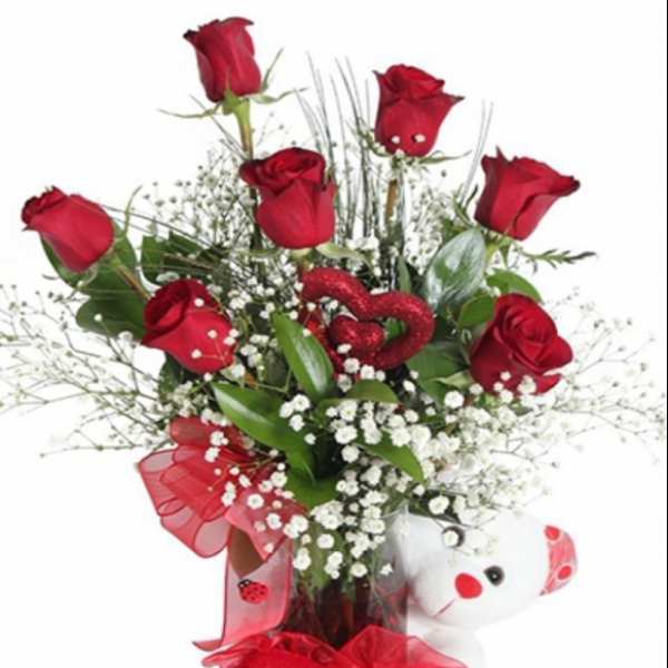  Döşemealtı Çiçek Siparişi Silindir Vazoda 7 Adet Gül ve Şirin Ayıcık